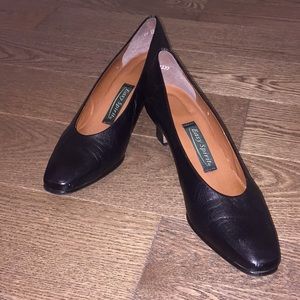 Women’s black shoes.